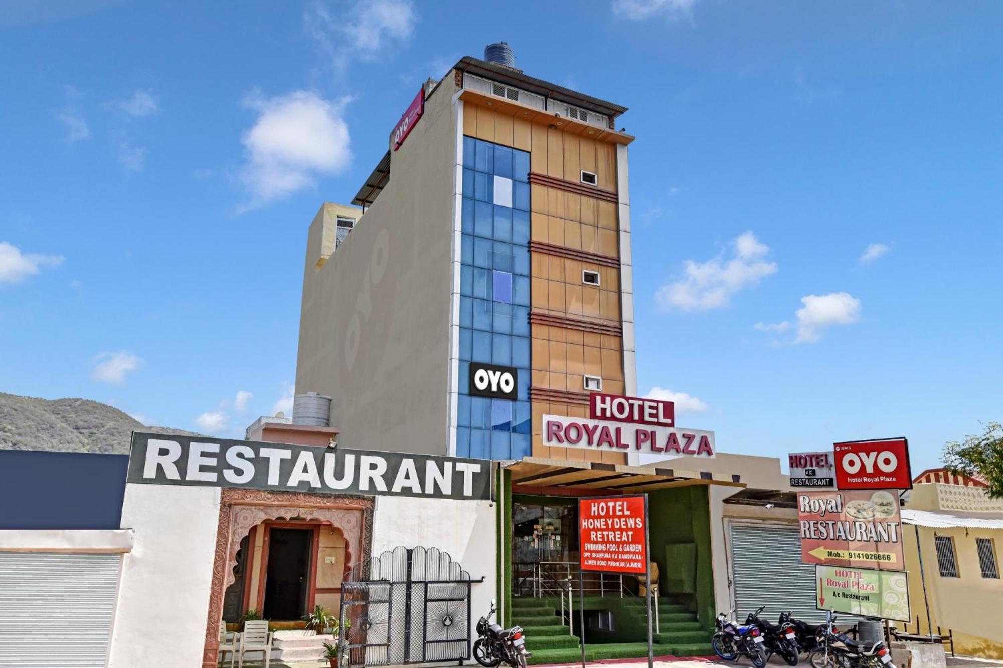 Oyo 10413皇家广场酒店 布什格尔 外观 照片